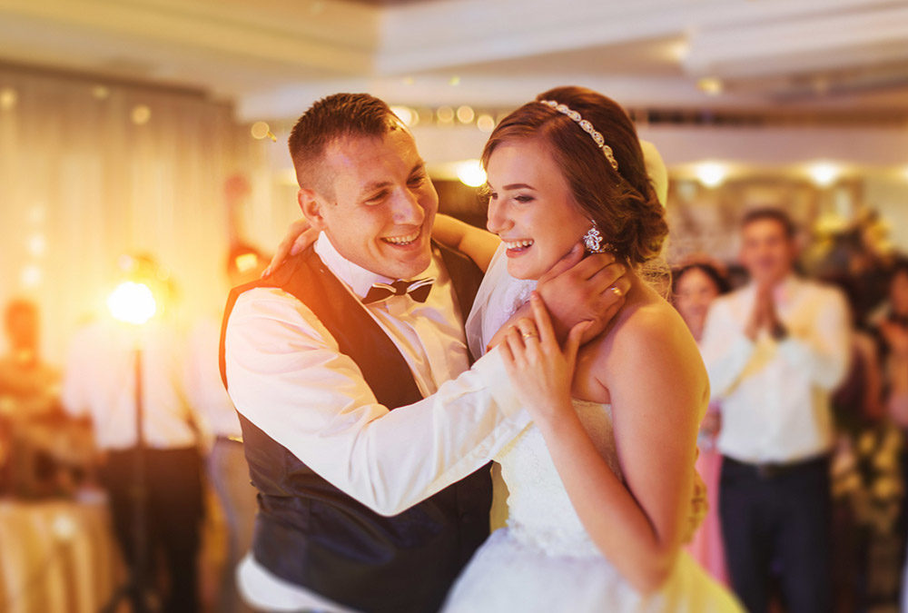 bride and groom dancing